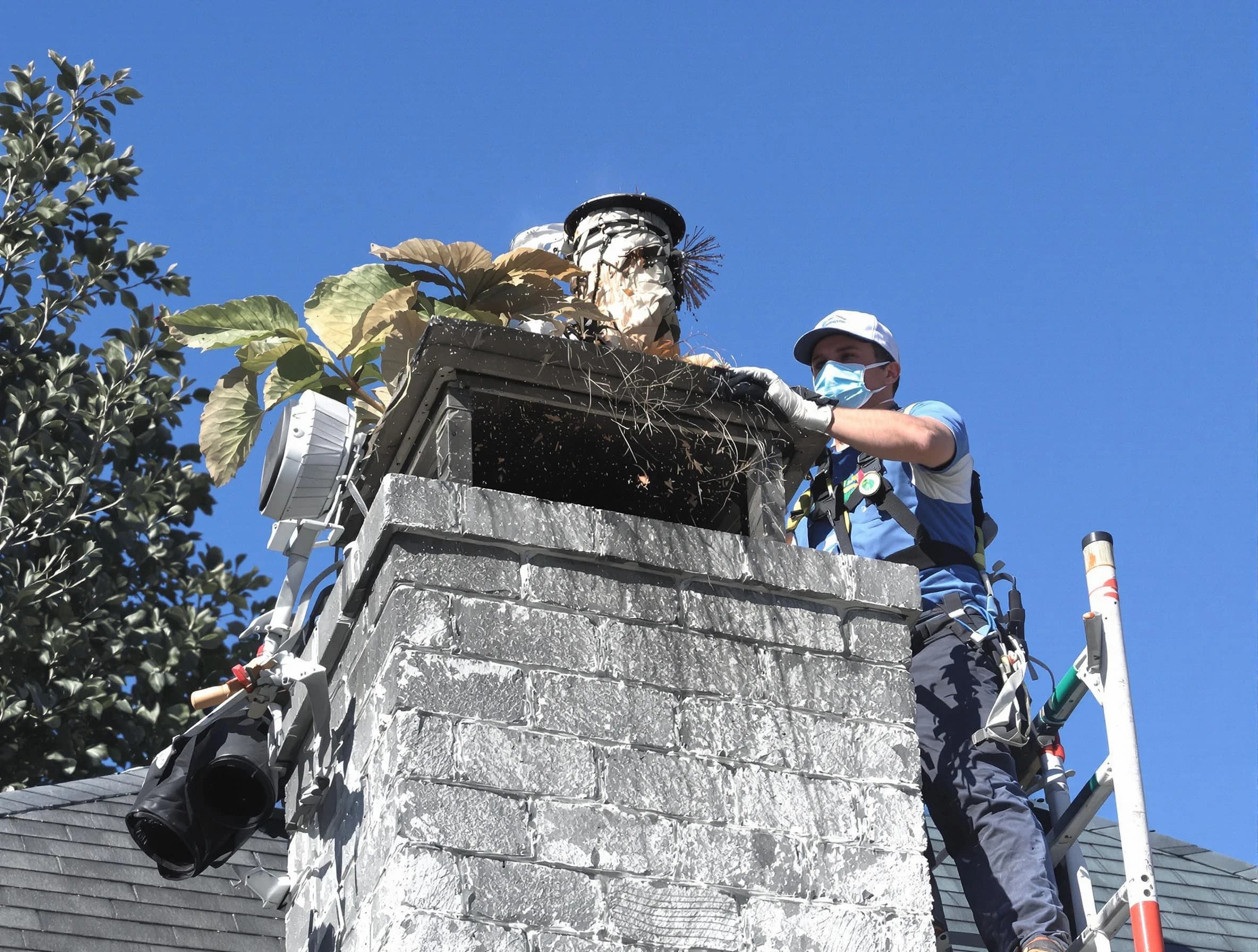 Guadalupe Chimney Sweep specialist performing chimney cleaning in Guadalupe, AZ